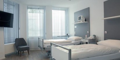 Schönheitskliniken - Einzelzimmer - Praxisklinik Dr. Henscheid Praxisklinik für Ästhetische Chirurgie