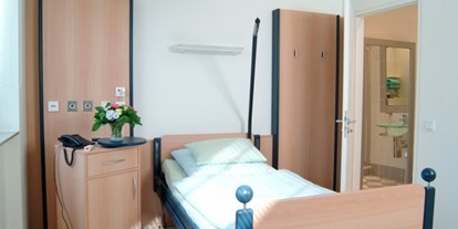 Schönheitskliniken - Haartransplantation - Bonn - Patientenzimmer auf Hotel-Niveau - hier können Sie sich wohlfühlen. - Moser-Klinik Bonn