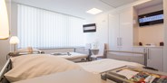 Schönheitskliniken - Tränensäcke entfernen - Nordrhein-Westfalen - An dieser Stelle möchten wir Ihnen unser klimatisiertes Patientenzimmer vorstellen.  
 - e-sthetic®